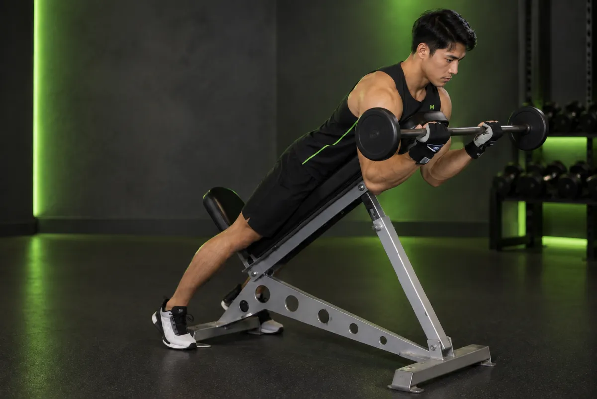 Barbell Curls Lying Against An Incline (End)
