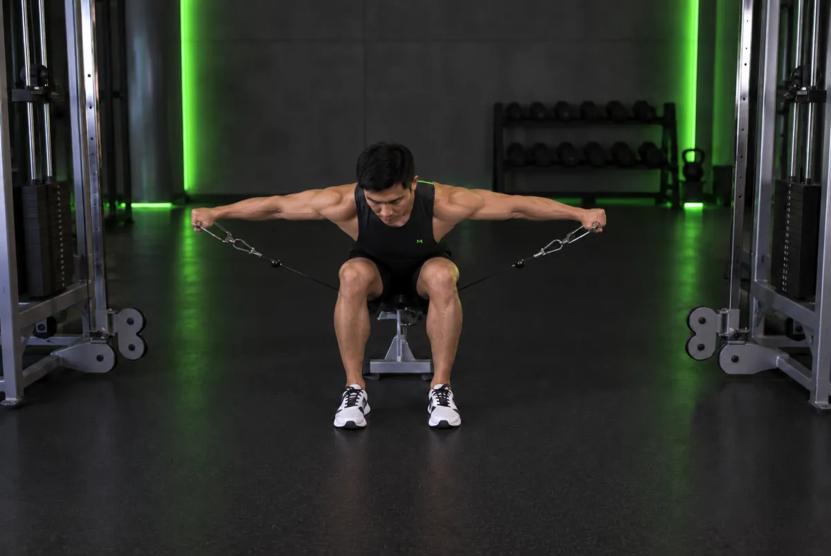 Nâng tay sang bên với cáp ngồi (cable seated lateral raise) (Kết thúc)