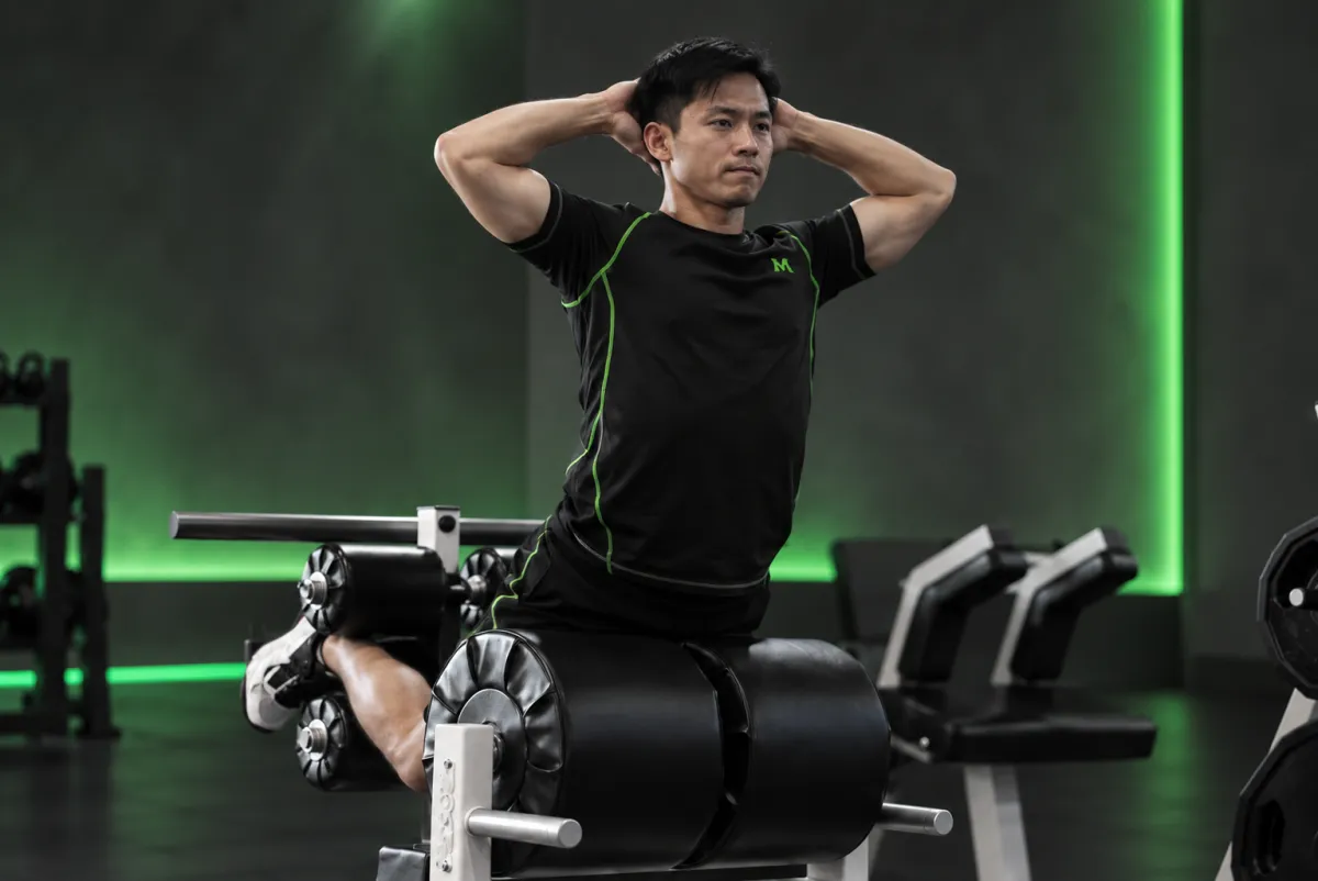 Gập đùi sau trên máy GHD (glute-ham raise) (Kết thúc)