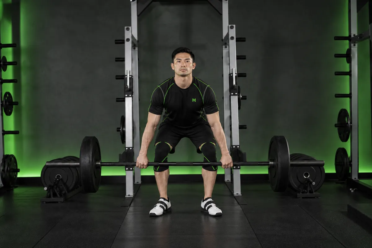 Hang clean từ dưới gối (hang clean below the knees) (Kết thúc)