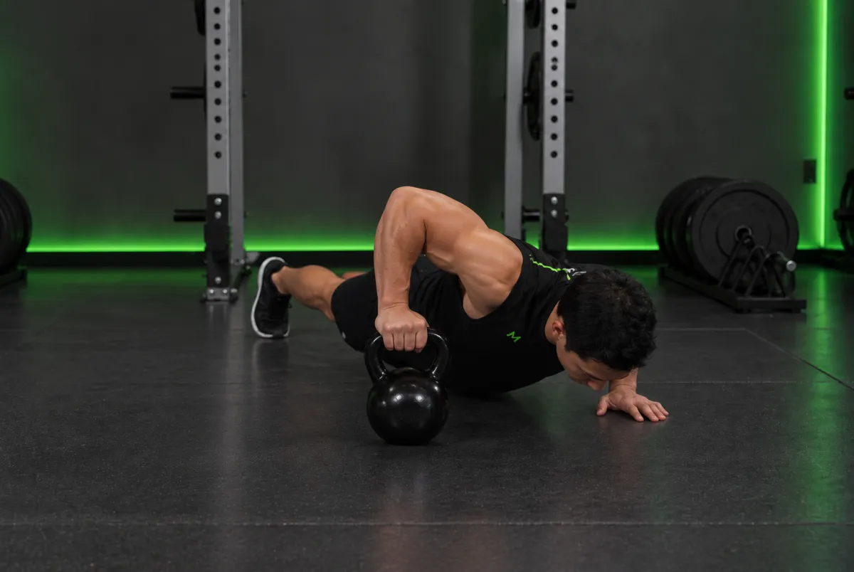 Plyo Kettlebell Pushups (End)