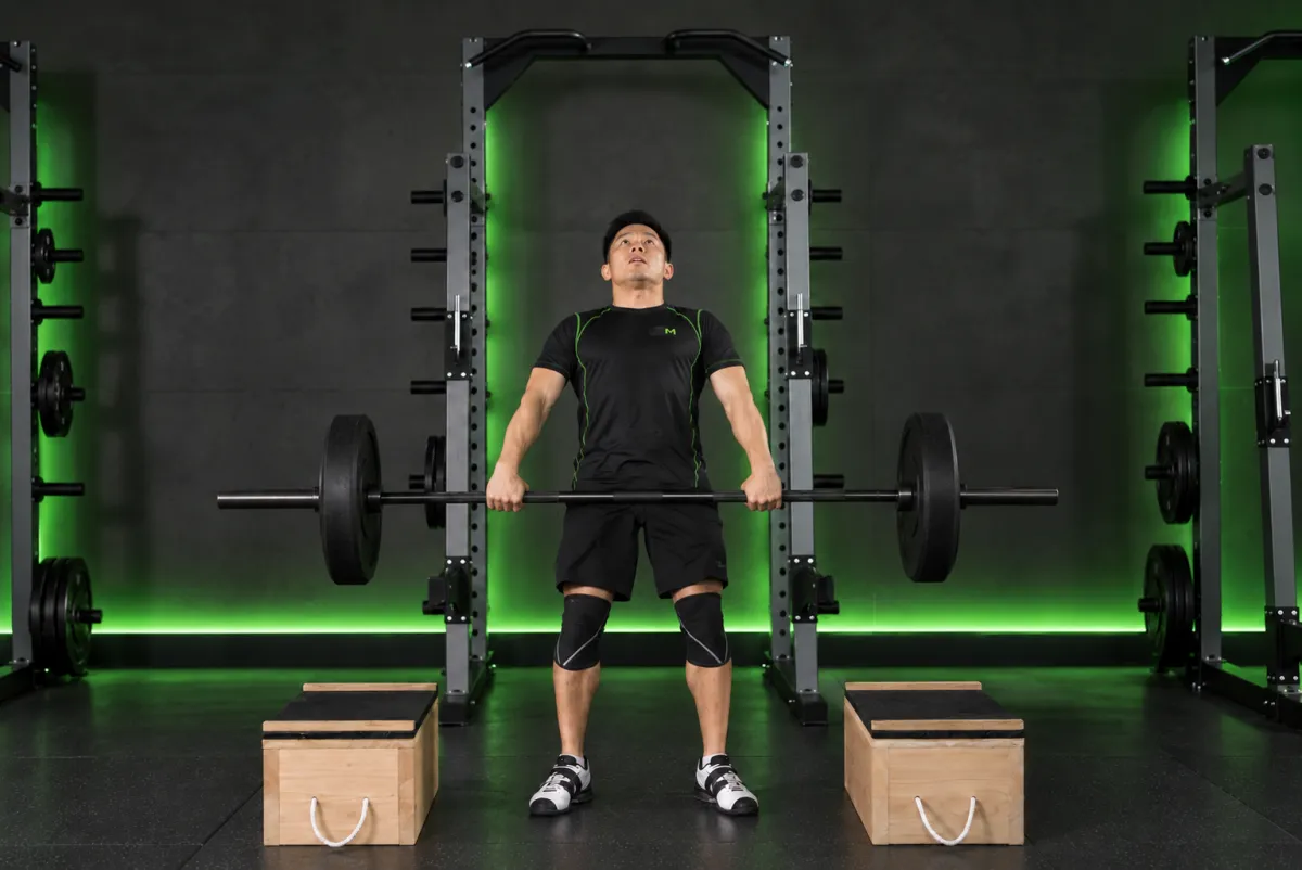 Power clean từ bục kê (power clean from blocks) (Kết thúc)