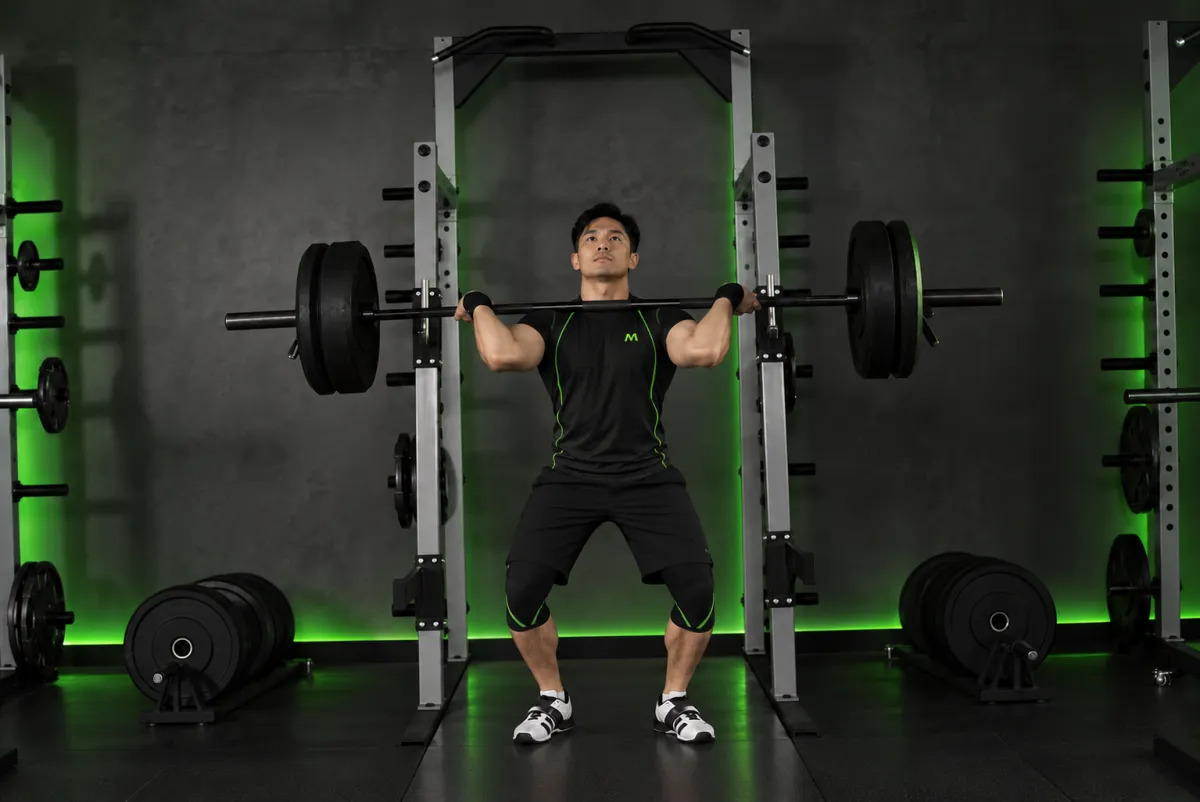 Push press (đẩy tạ qua đầu có nhún chân) (Kết thúc)