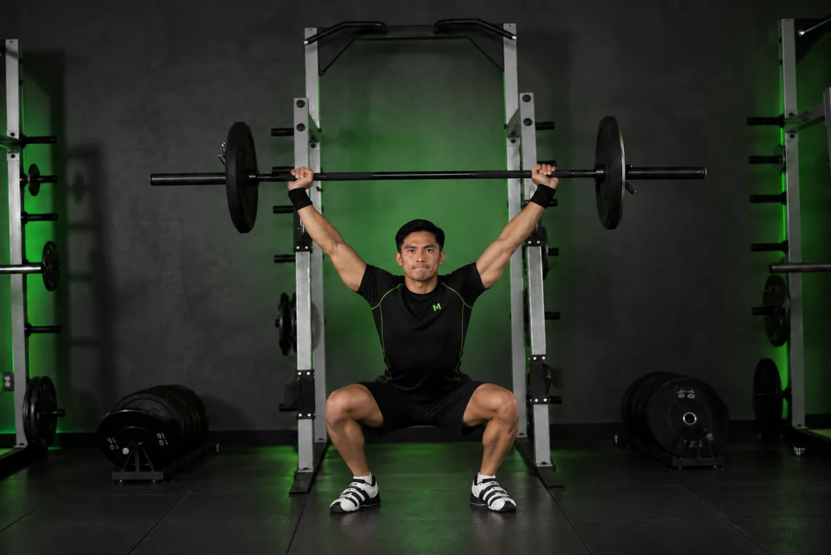 Snatch balance (đỡ tạ qua đầu từ vai) (Kết thúc)