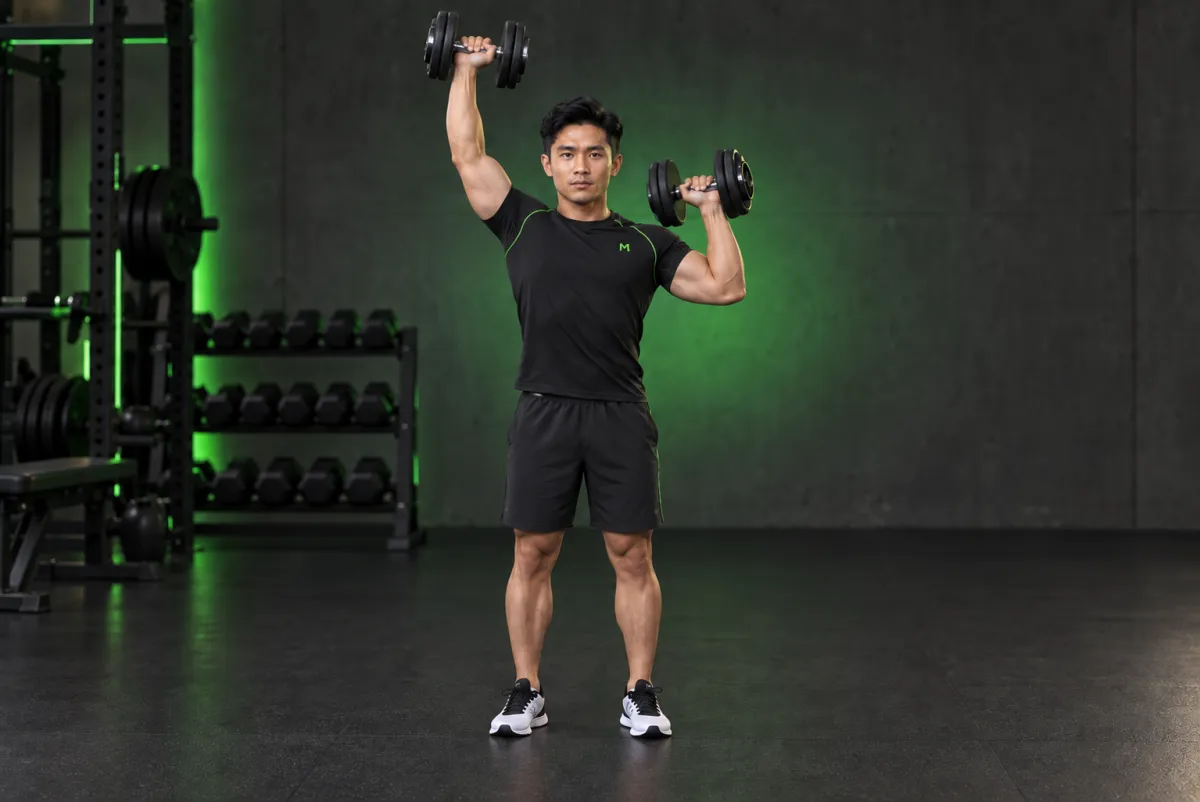 Standing Alternating Dumbbell Press (End)