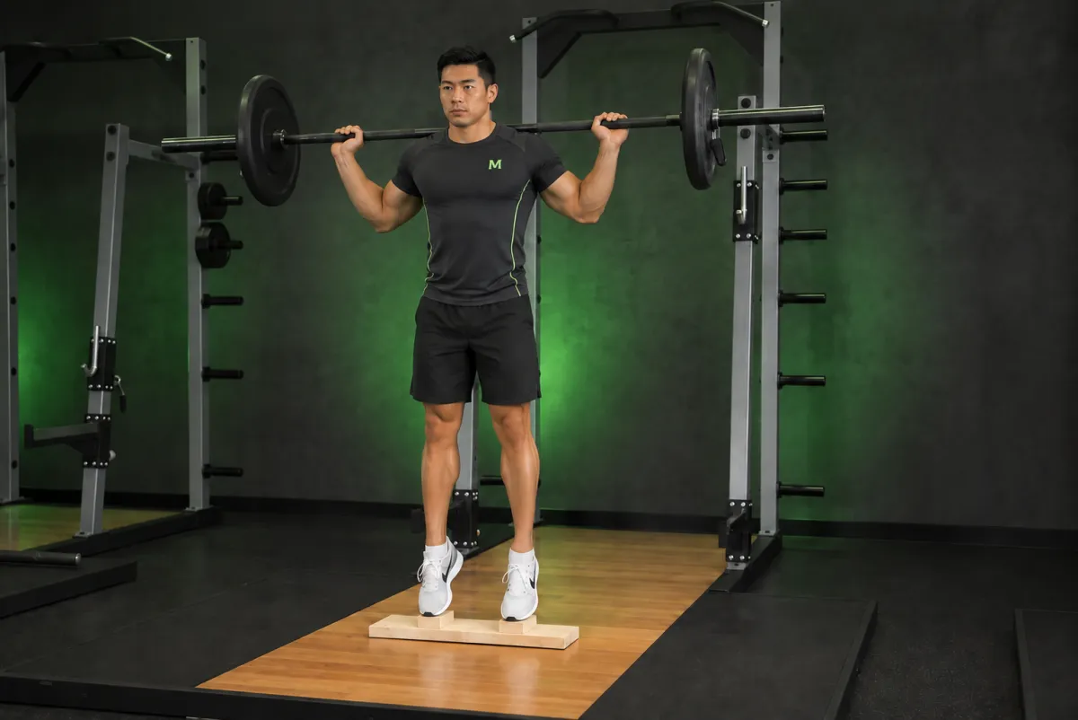 Standing Barbell Calf Raise (End)