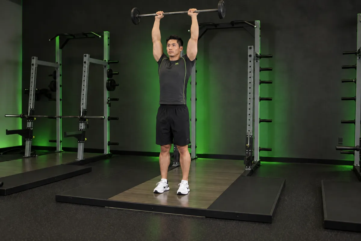Standing Front Barbell Raise Over Head (End)